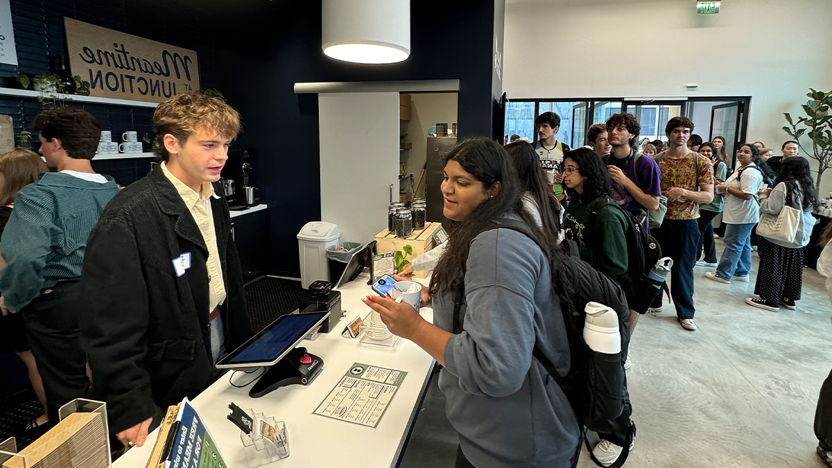 A long line of students and community members waiting to order at Meantime Coffee's newly opened Junction location.